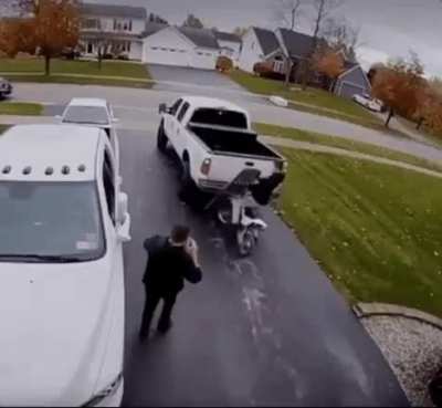 Showing us the "Easy" way to load a bike....