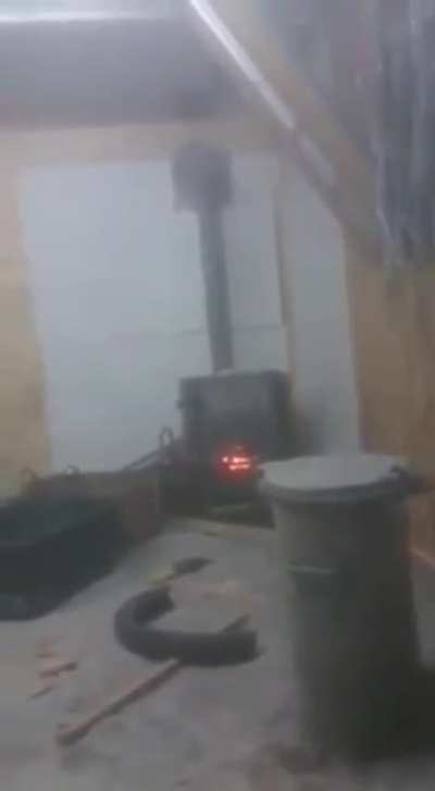 Throwing aerosol can in a wood stove