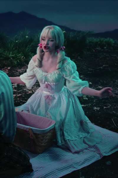 Dove Cameron in her "farmer's daughter" look is perfect for a roll in the hay