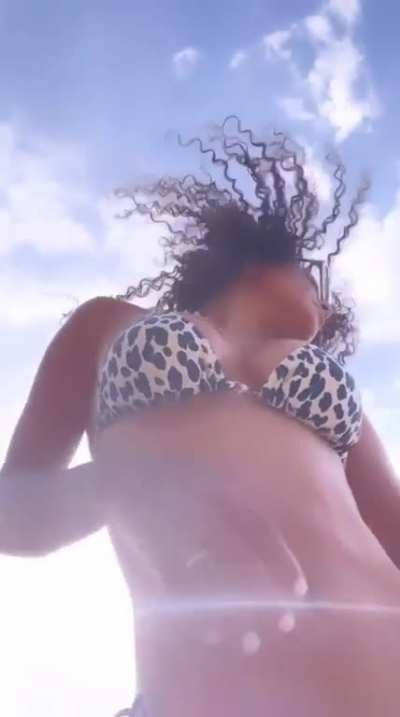 Christina dancing while on vacation