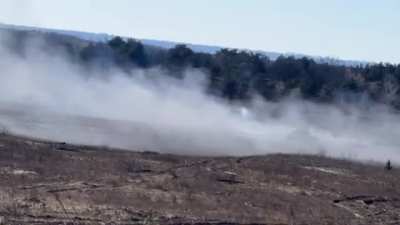 Ukrainian forces use a UR-77 Meteorit vehicle to clear a mined area somewhere in eastern Ukraine