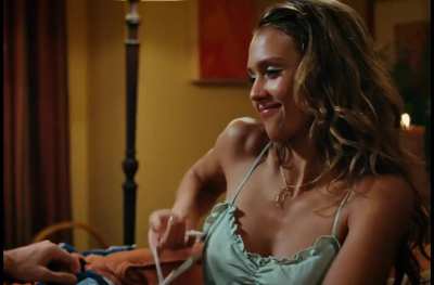 Jessica Alba taking off her bra