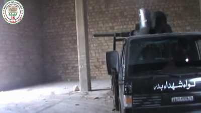 FSA BMP Technical slings a round through the window of an SAA occupied position - 12/15/2013