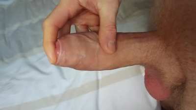 Stroking my wet uncut cock