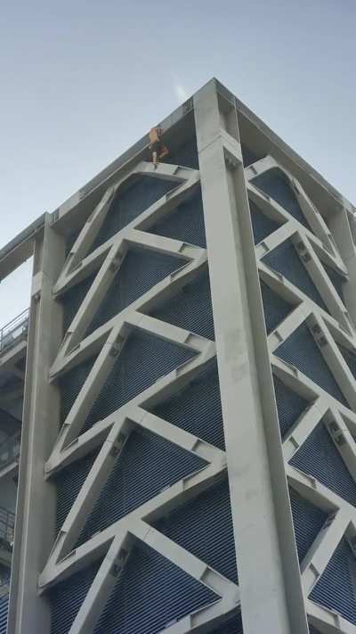 Man climbing the Leadenhall building in London. Nothing but chalk on his hands and dream. Wait till the end to see the height!