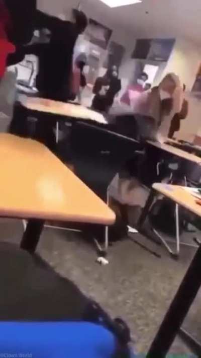 Teacher struck on the head by a student with a chair. She tried to stop the fight.