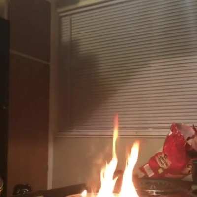 chef boyardumbass tries to put out an oil fire with water