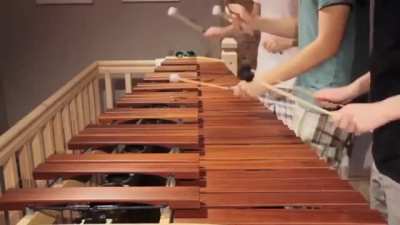 These three dudes and their incredible synchronization skills playing Zelda on the Marimba