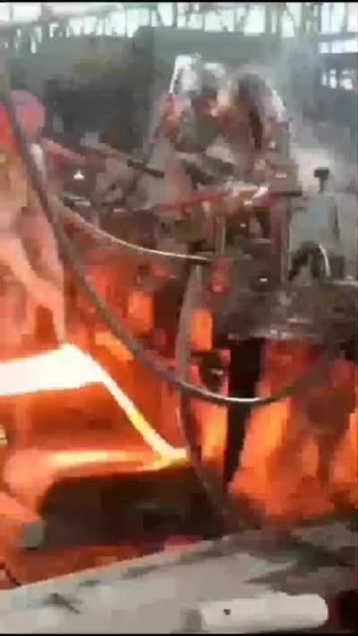 Workers pour water on themselves to maintain normal body temperature