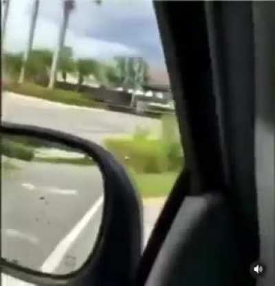 Filming accident instead of driving