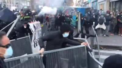 Compilation of today protests in Paris against the Global Security bill - The new article would amend current legislation to make it an offense to show the face or identity of any officer on duty "with the aim of damaging their physical or psychological i
