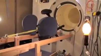 Guys doing experiments to see how dangerous magnetic items are near an MRI machine