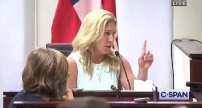 Here's Marjorie Taylor Greene denying that she ever said Speaker Pelosi was a "traitor to our country" and then being presented with evidence that she in fact said that.