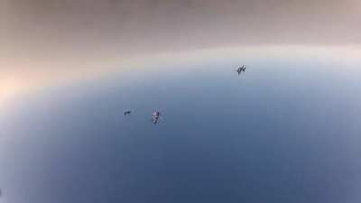 Two skydivers collide mid-air, knocking one of them unconscious. Camera man proceeds to pull some mission impossible shit and saves his life.