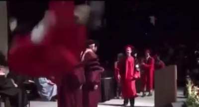 to do a backflip during graduation.