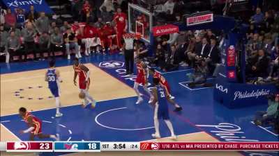 [Highlight] Embiid watches as he refuses to be put on another poster by John Collins