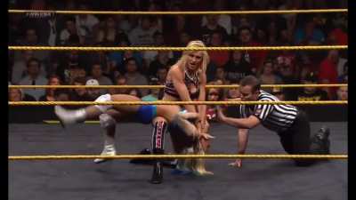 Charlotte stretches Alexa out in a backbreaker submission making it &ldquo;difficult for her to breathe&rdquo;