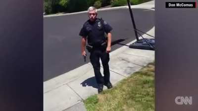 Police officer pulls gun on a non-threatening man in a residential neighborhood