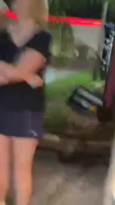 Karen calls 911 on driver because they wouldn't let Karen cut in front of them at a Burger King drive-through after Karen made an illegal turn. Karen then proceeds to stand in front of their car with her husband and not let them through, holding up the wh