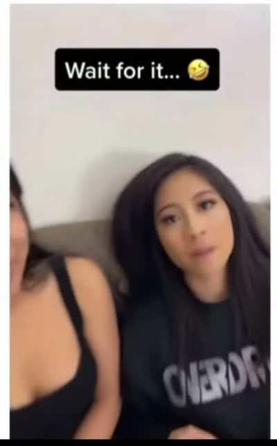Running a finger through her hair