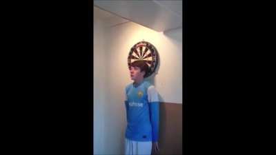 WCGW standing right next to a dartboard