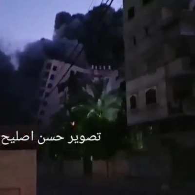 WATCH (O_O) israeli warplanes destroying a residential building, leveling to the ground! This is another israel"s crime &amp;amp; war crime against defenseless Palestinians civilians in Gaza