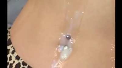 Dripping down her body
