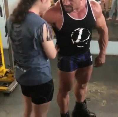 Blind girl feeling muscles!