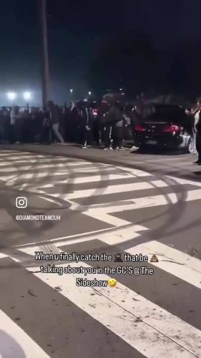 Folks freak out after filming a guy shove another guy directly into a drifting car. 