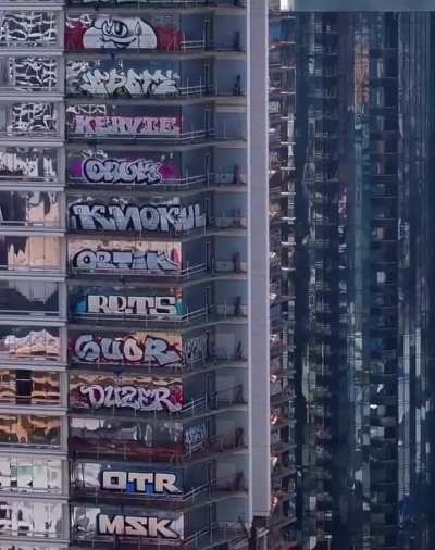 Graffiti Artists tag towers in Downtown Los Angeles, USA
