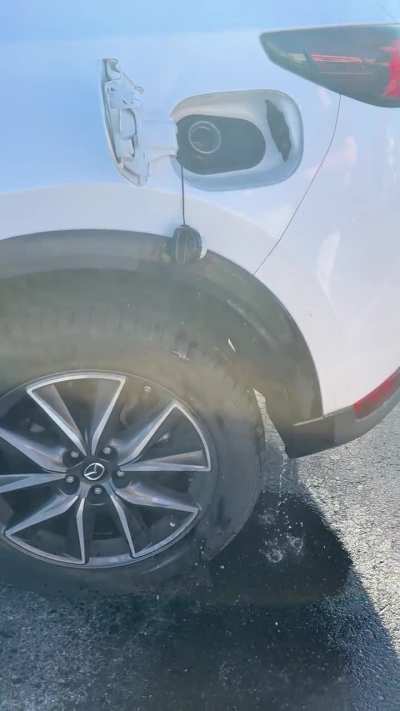 Car spitting gas
