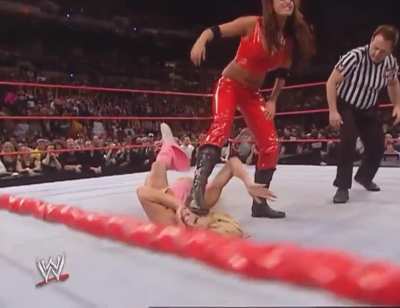 Candice Michelle Grinds Her Boot in Torrie Wilson&rsquo;s Face