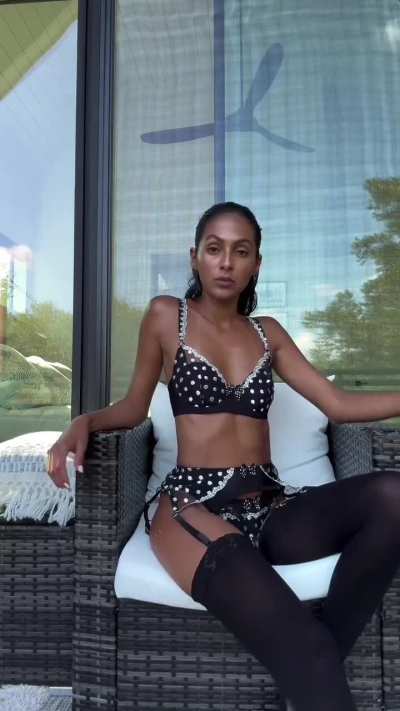 Isla Tuya in haute couture lingerie and black stockings 🖤 Hello October!