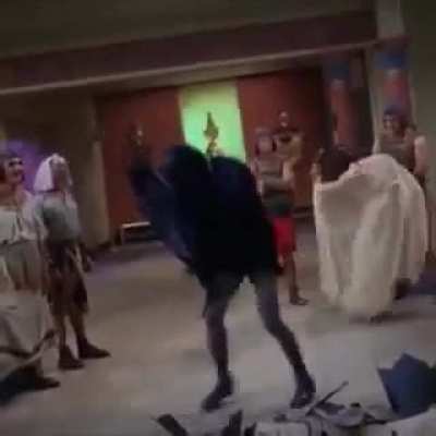 Adam West as DC comics Batman performs the memorable Batusi in 1966