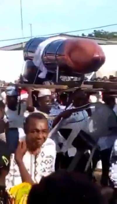 Woman who had 10 kids from 10 men buried in a penis coffin