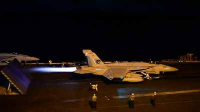 Carrier Air Wing 2 conduct night-time flight operations on the flight deck aboard Nimitz-class aircraft carrier USS Carl Vinson (CVN 70) Sept. 17, 2021.(WARNING it&rsquo;s LOUD).[video]