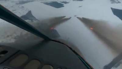Su-34 firing S8 rockets at Ukrainians position.