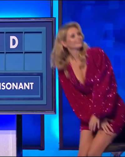British TV Presenter And Human Calculator Rachel Riley on "Countdown" Accidentally Squeezing Her Clothed Boobs Together With Her Arms Showing Her Cleavage While Sitting Down (Also With Slo-Mo)