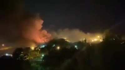 Massive fire, shooting and explosion sounds happening inside and outside of Evin Prison in Tehran (Iran) following the ungoing revolution.