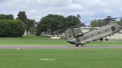Skilled Chinook Pilot Does A "Pinnacle Landing" Then Climb Away Backwards