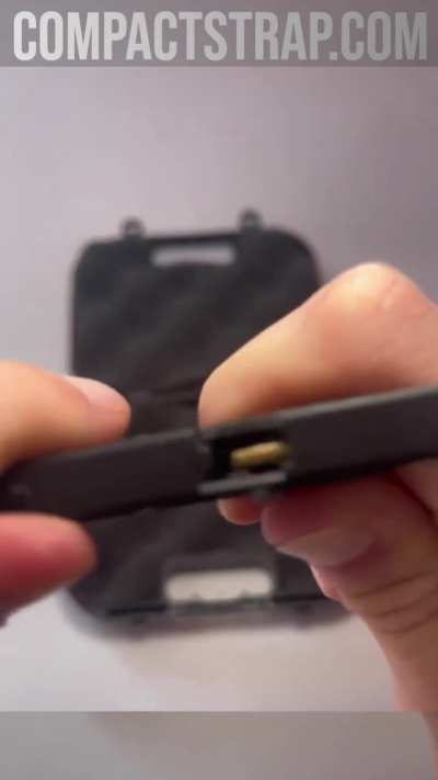 A mini pistol that can eject shells