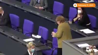 German Chancellor Angela Merkel forgets her mask