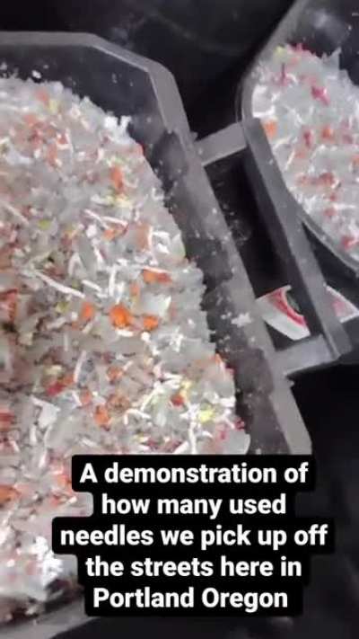 An employee of a bio cleaning company in Portland shows off how many used needles they cleaned up off the streets