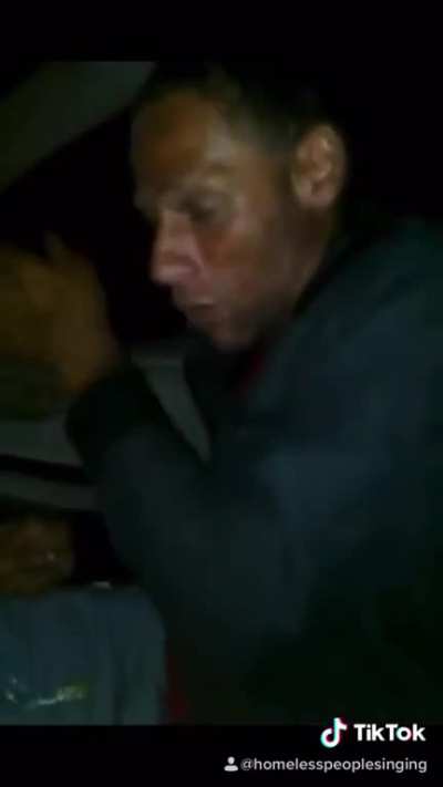 Super talented homeless man singing his heart out.