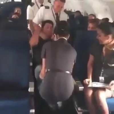 Apparently this is how the cabin crew trained to deal with disruptive passenger