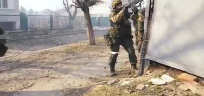 Russian soldiers attempt to storm a house. Mariupol, 2022