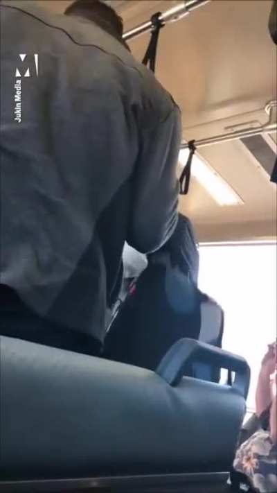 Man eats a burrito on a train - another passenger takes offence.