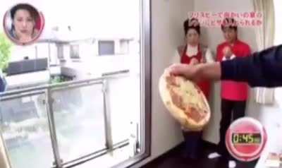 Man throws a pizza into the microwave