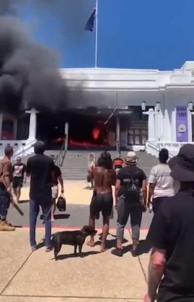Australia. Protesters set fire to the former Parliament building.