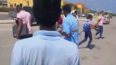 parent brings gardning tools 2 schoolfight